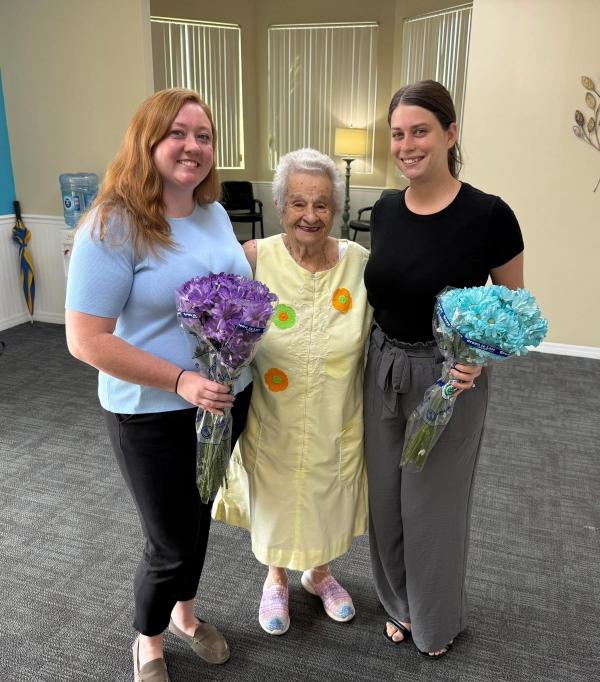 Dr. Nemo and Brittani with a patient