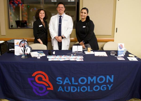Amanda Martinez (Care Director), Dr. Philip Salomon (Owner and Audiologist), and Daisy Lopez (Patien