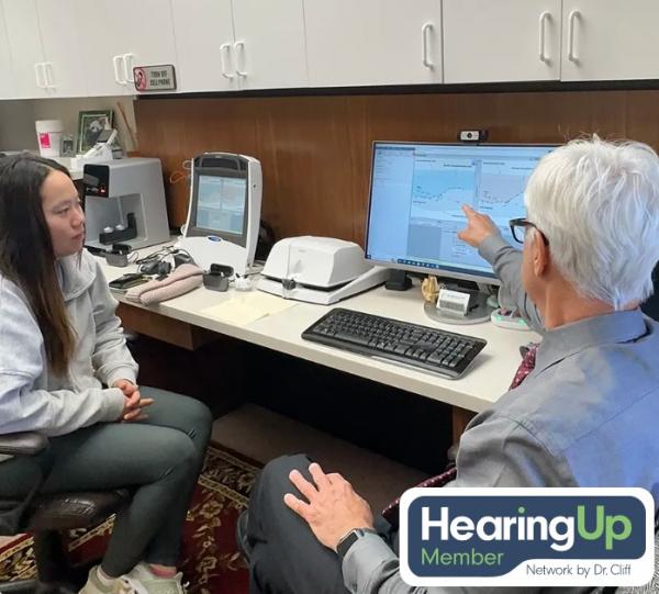 Dr. John Martinetti, Au.D. with a patient