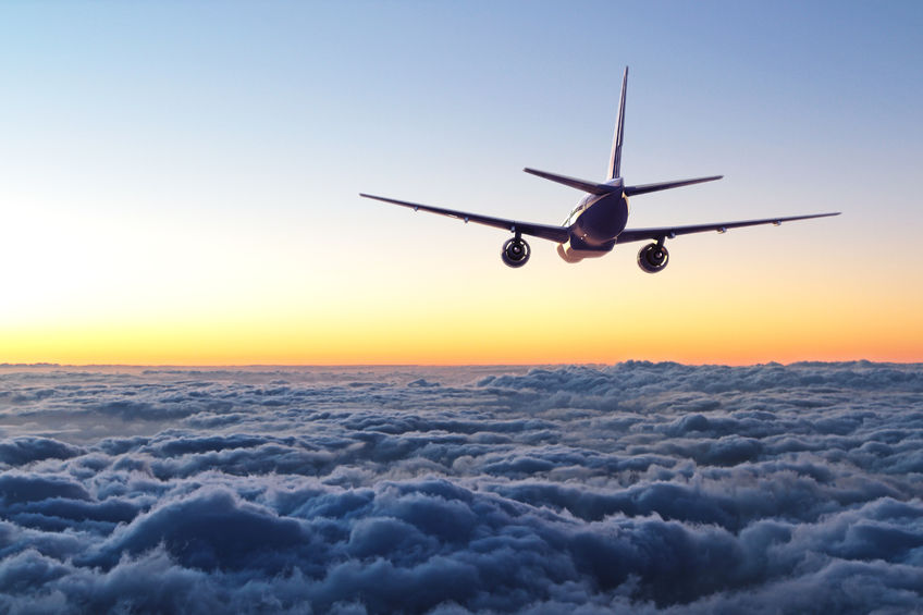 An airplane flies in the air.