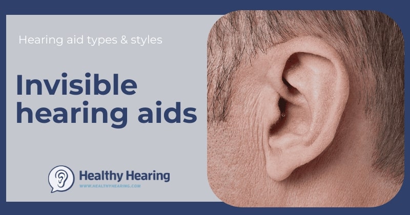A man wearing an invisible hearing aid with a pull-out string.