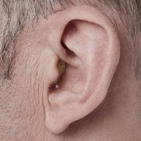 Picture of a completely-in-the-canal hearing aid.