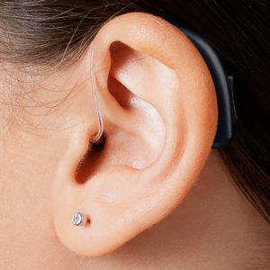 A receiver-in-the-ear hearing aid with a dome