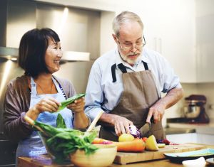 A couple prepares dinner.