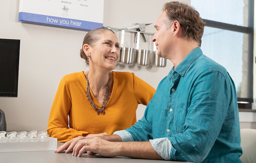 A couple at a hearing care appointment