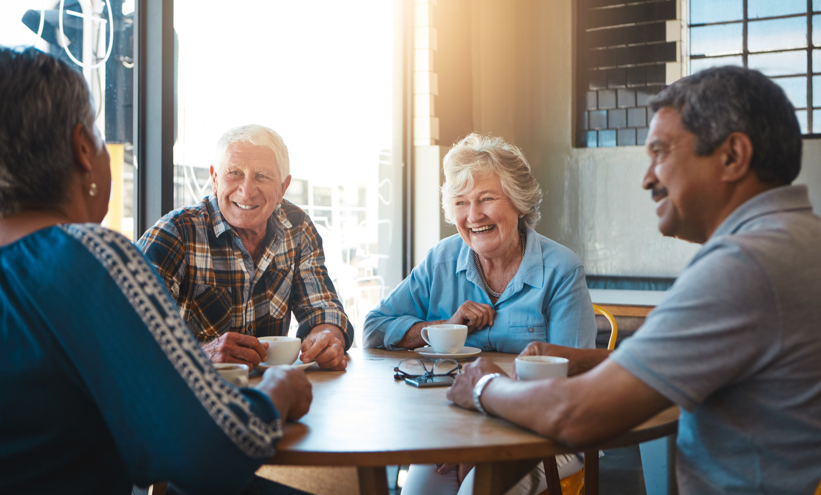 A support group for people with hearing loss gathers together. 